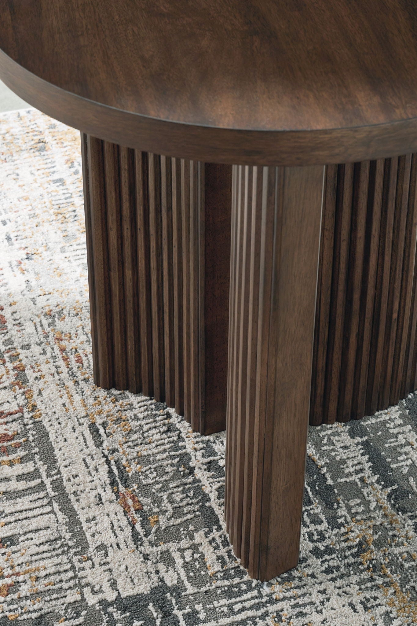 Korestone - Dark Brown - Round End Table - Hornell Furniture Outlet