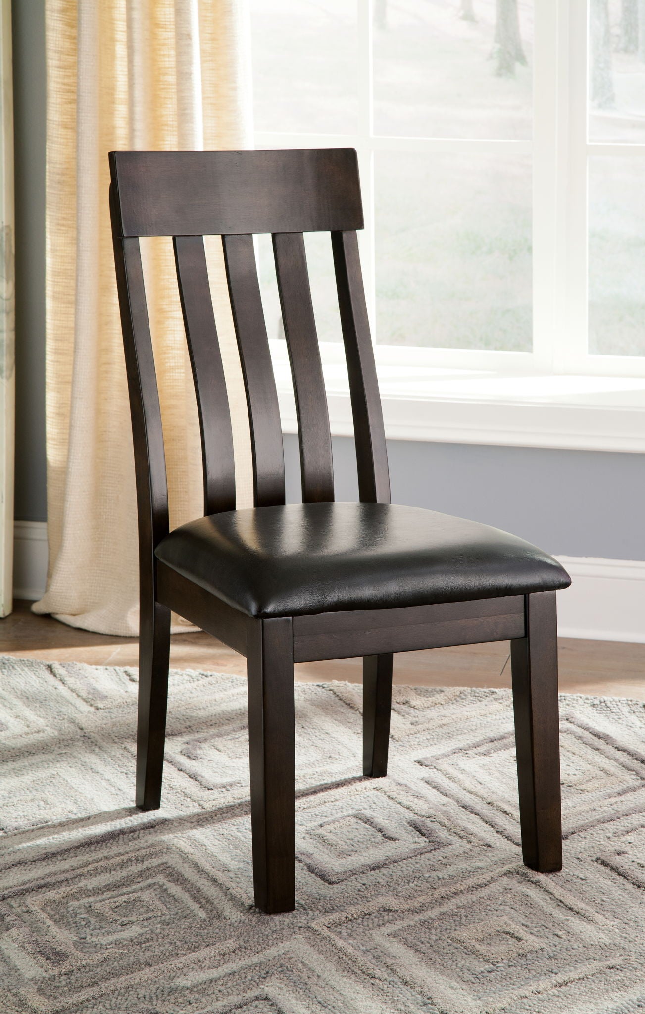 Haddigan - Dining UPH Side Chair (Set of 2) - Dark Brown - Hornell Furniture Outlet