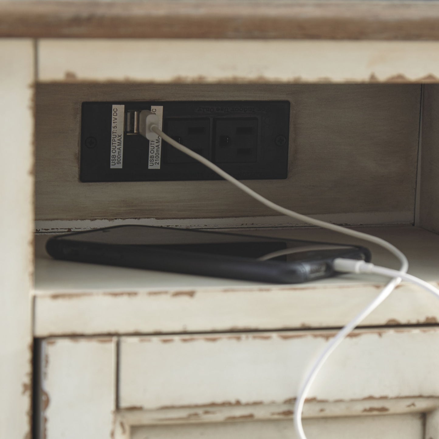Realyn - White / Brown - Chair Side End Table - AC / USB - Hornell Furniture Outlet