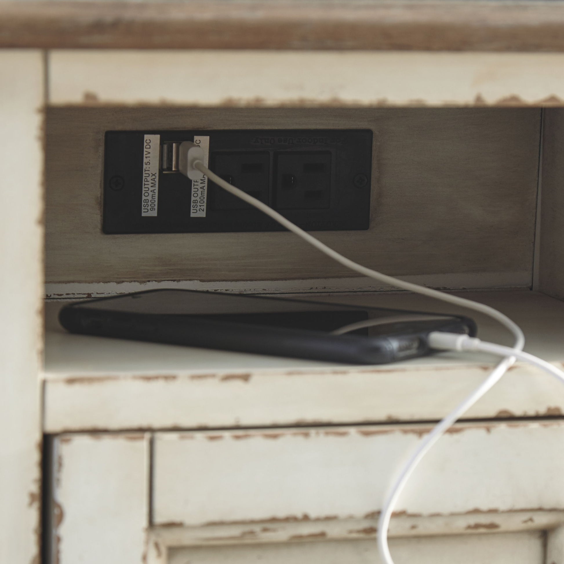 Realyn - White / Brown - Chair Side End Table - AC / USB - Hornell Furniture Outlet
