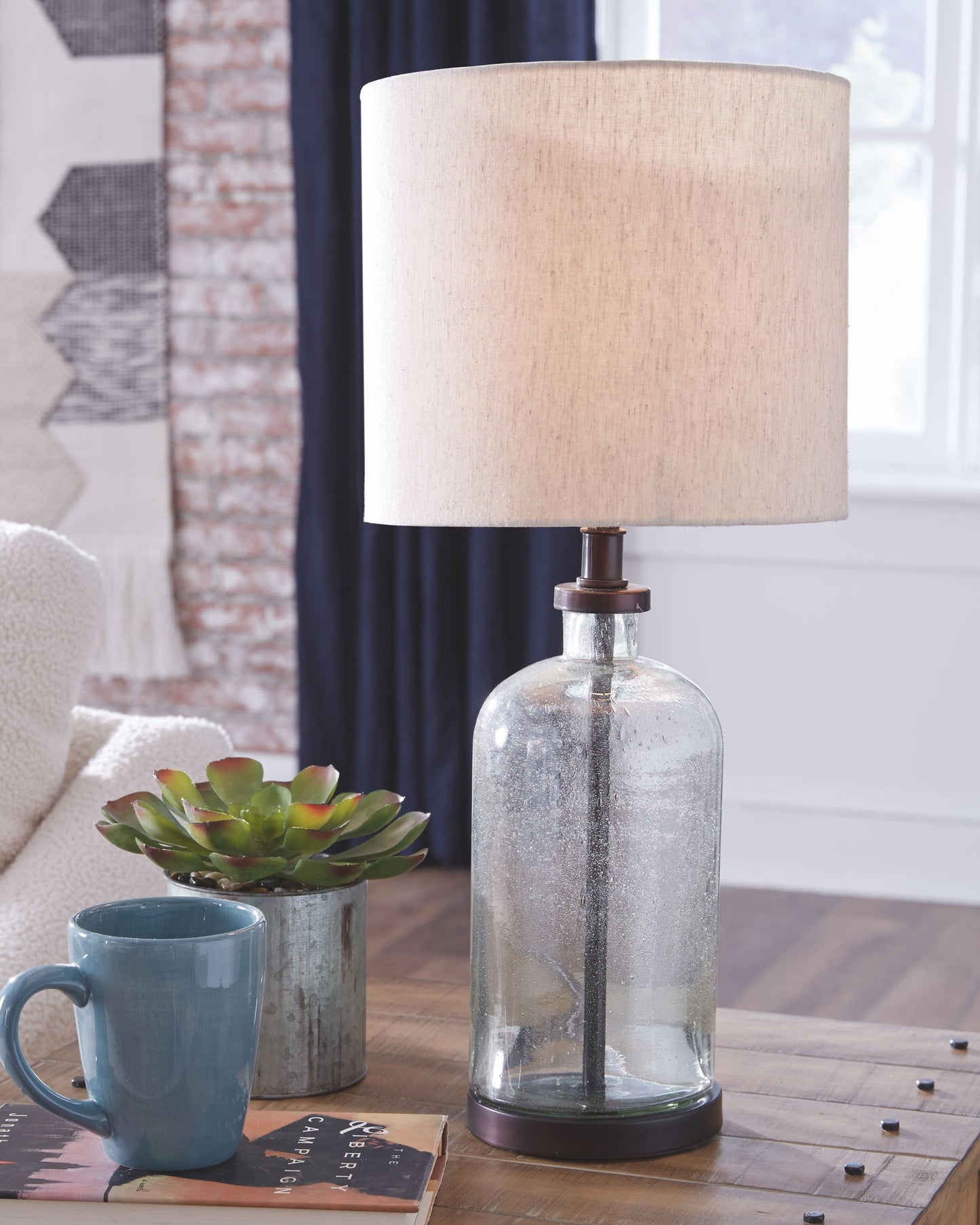Bandile - Clear / Bronze Finish - Glass Table Lamp - Hornell Furniture Outlet