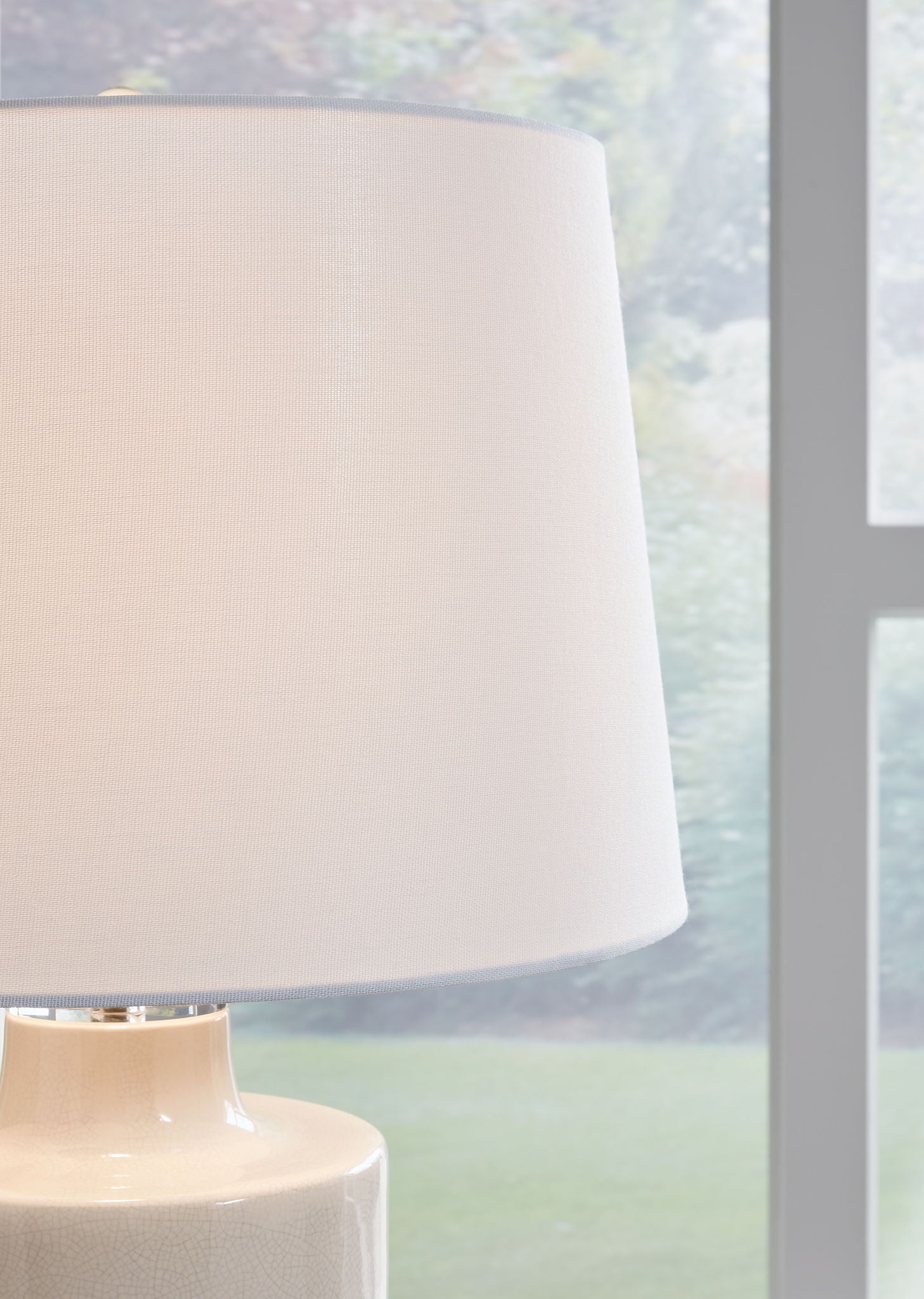 Cylener - Off White - Ceramic Table Lamp - Hornell Furniture Outlet