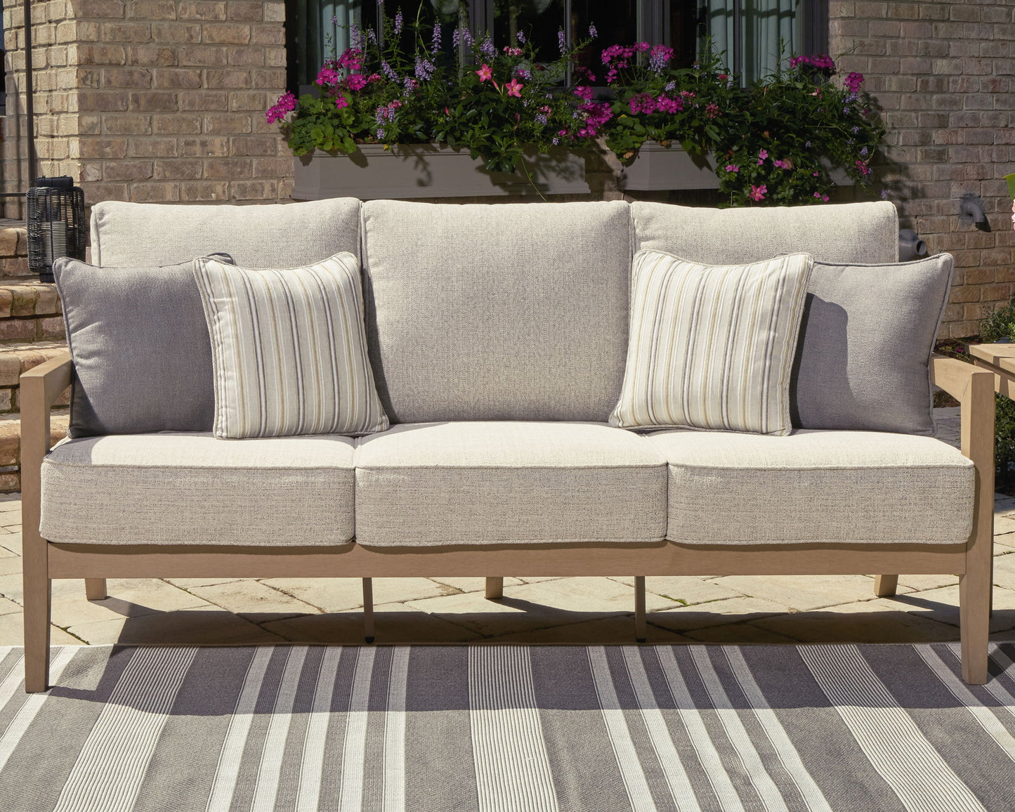 Hallow Creek - Driftwood - Sofa With Cushion - Hornell Furniture Outlet