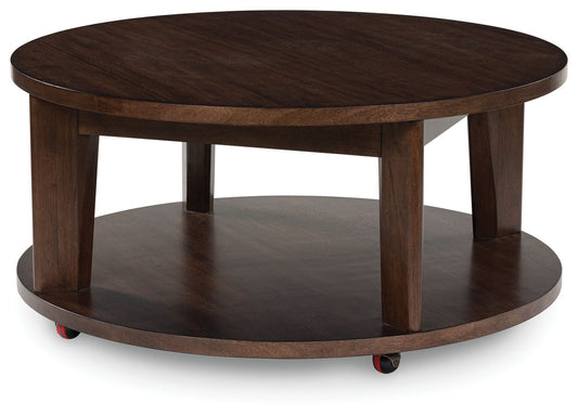 Korestone 2 - Dark Brown - Round Cocktail Table - Hornell Furniture Outlet