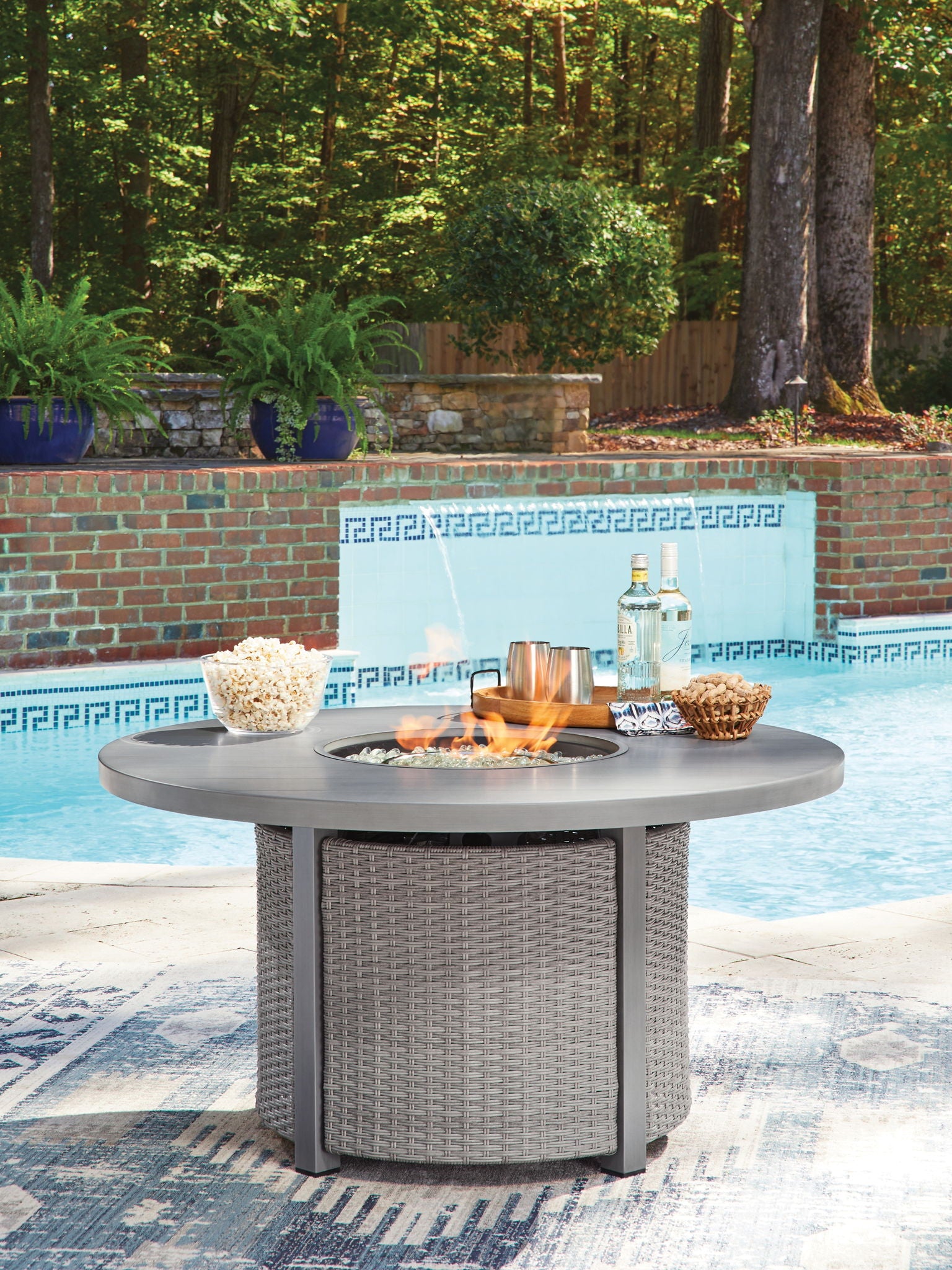 Half Moon Beach - Round Fire Pit Table - Gray - Hornell Furniture Outlet