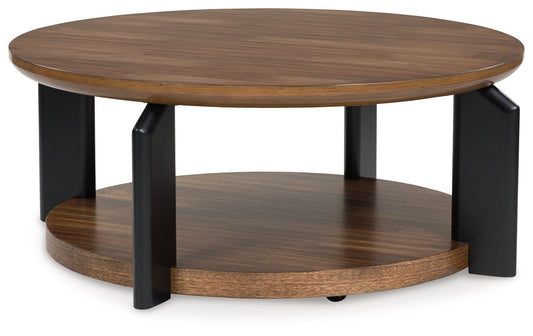 Kraeburn - Brown / Black - Round Cocktail Table - Hornell Furniture Outlet