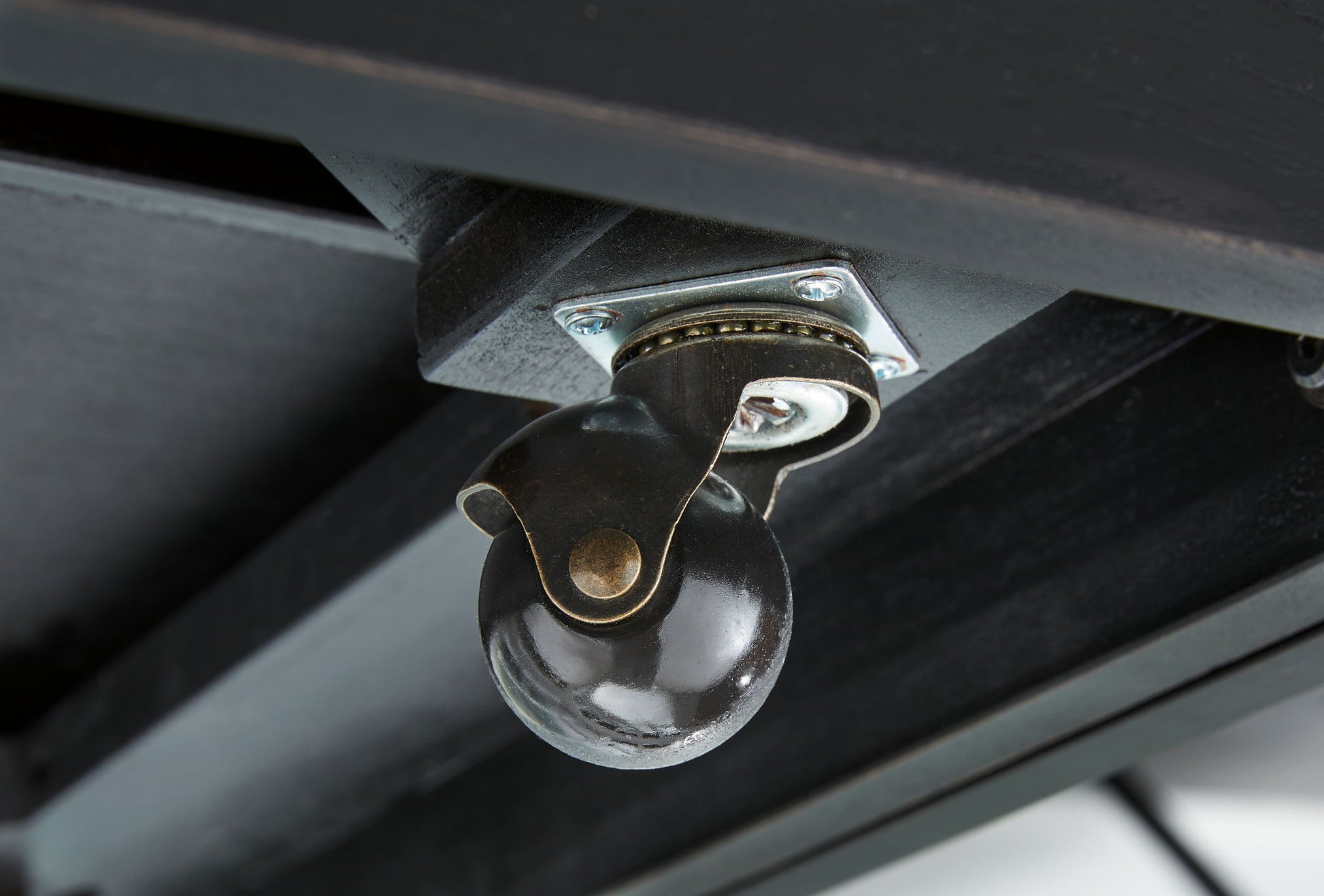 Winbardi - Black - Oval Cocktail Table - Hornell Furniture Outlet