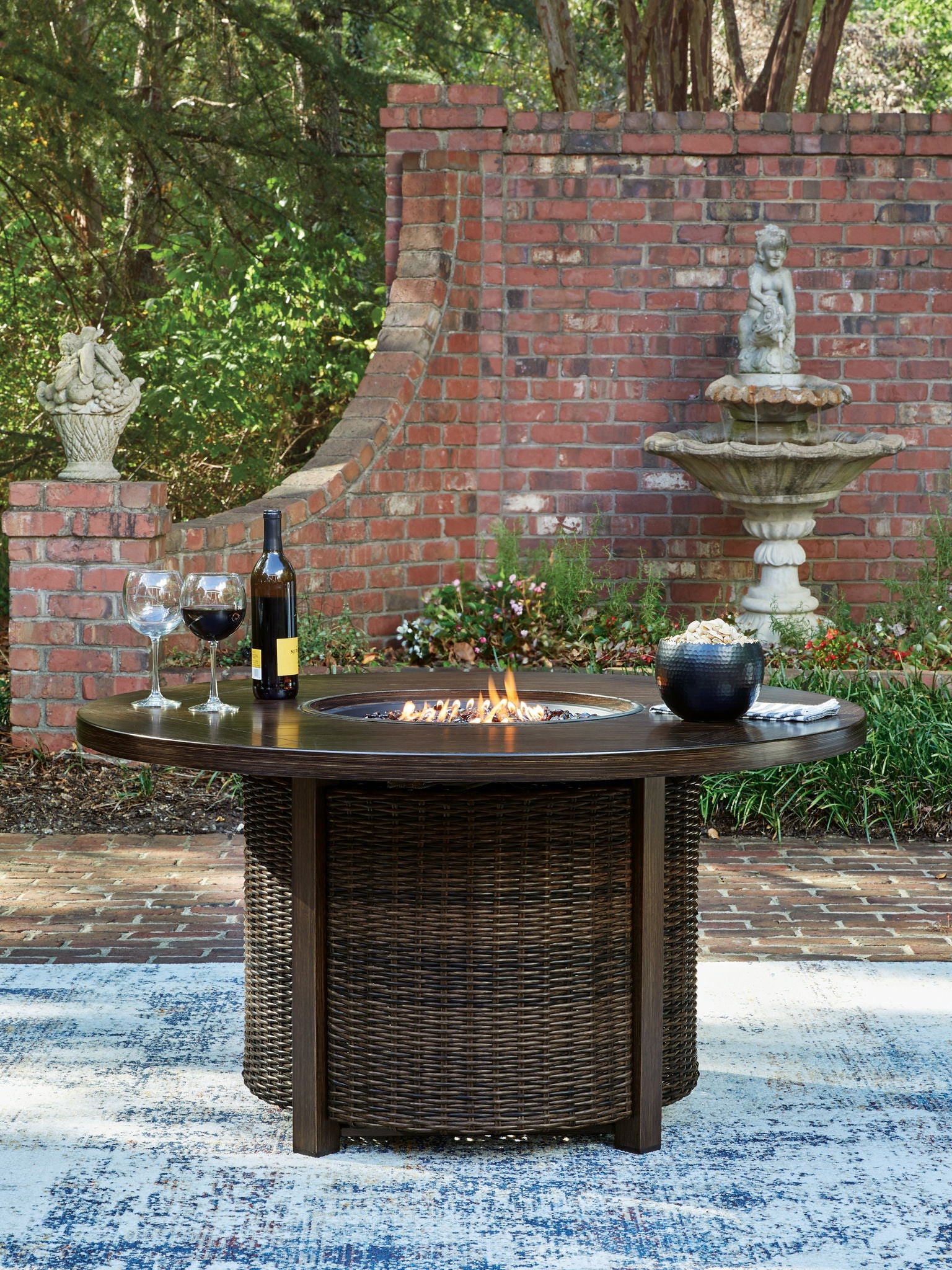 Monterey Point - Round Fire Pit Table - Dark Brown - Hornell Furniture Outlet