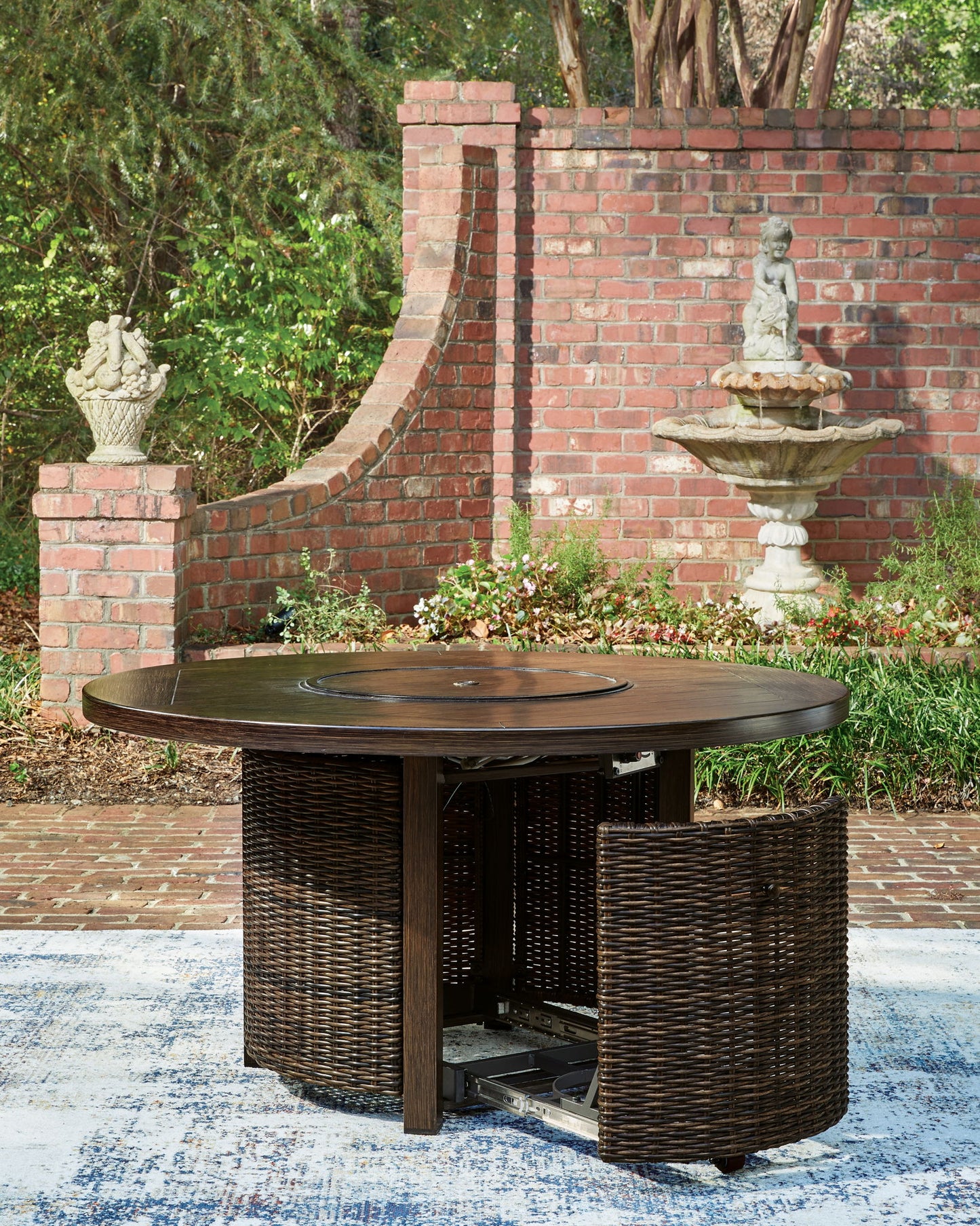 Monterey Point - Round Fire Pit Table - Dark Brown - Hornell Furniture Outlet