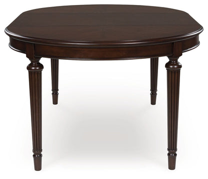 Lavinton - Brown - Oval Dining Room Extension Table - Hornell Furniture Outlet