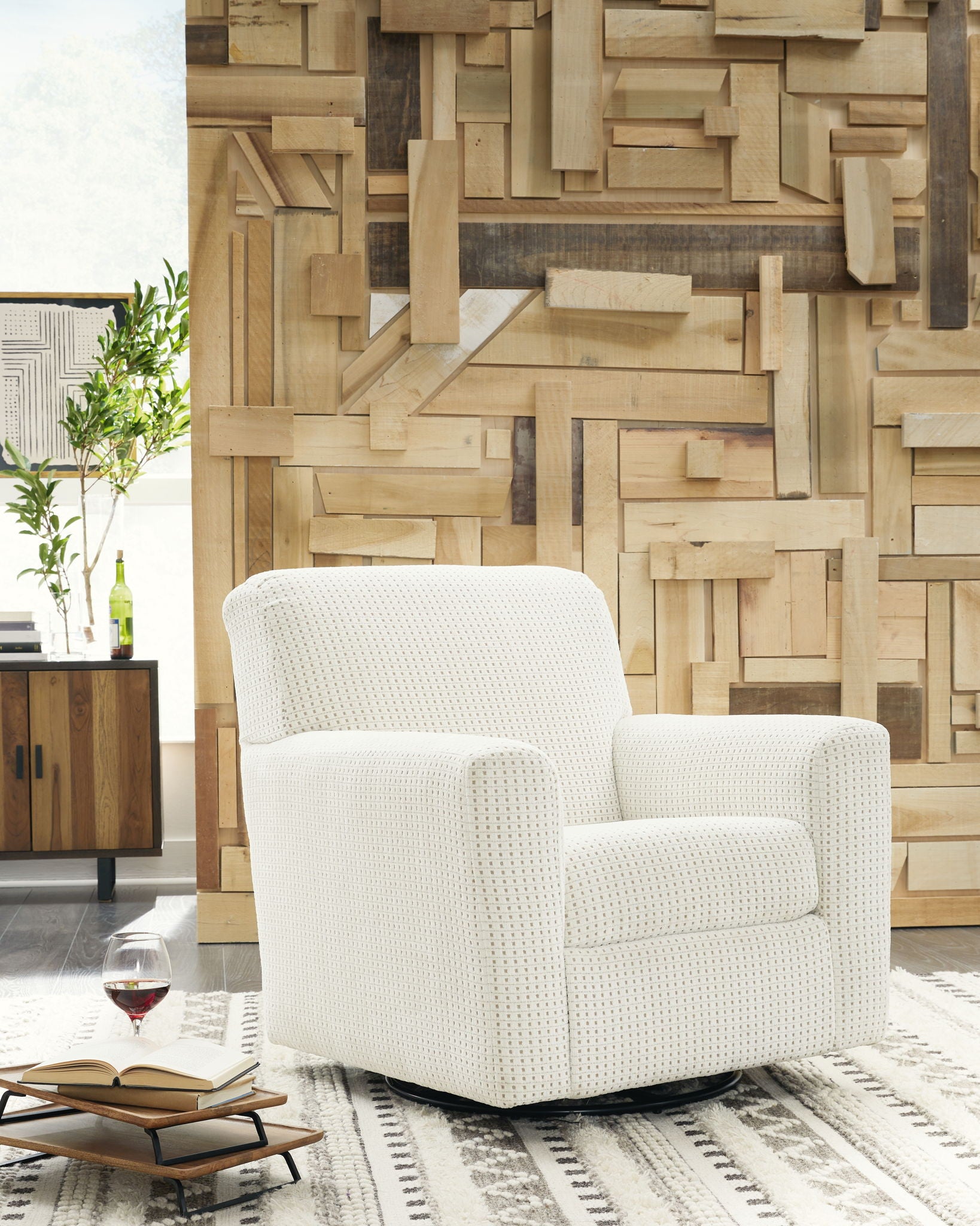Herstow - Swivel Glider Accent Chair - Hornell Furniture Outlet
