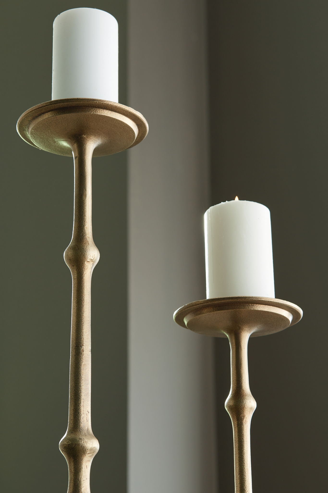Larwick - Antique Brass Finish - Candle Holder Set (Set of 2) - Hornell Furniture Outlet