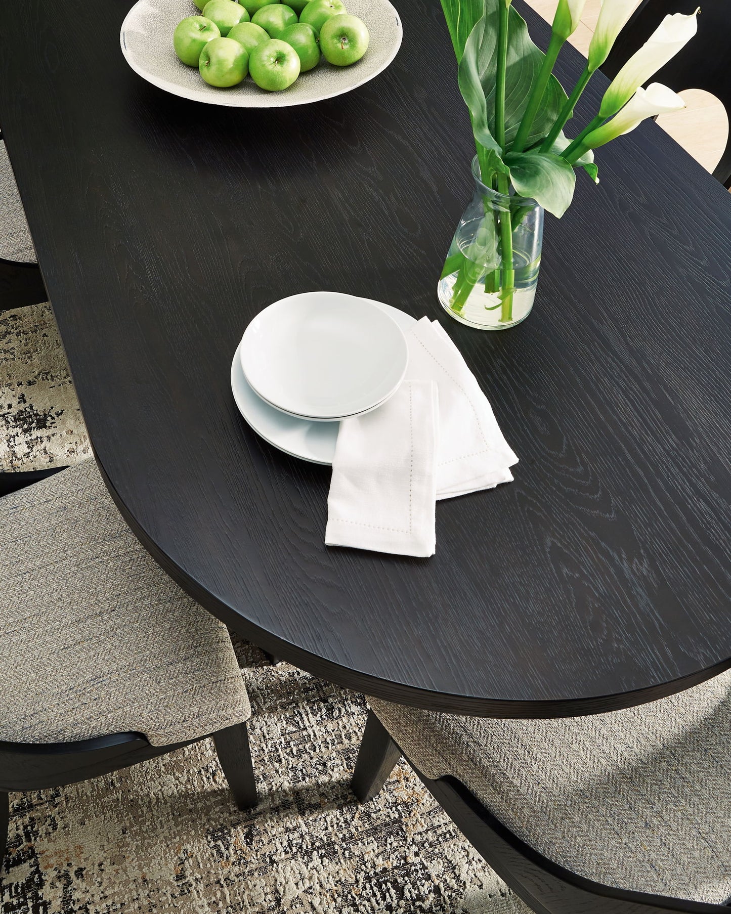 Rowanbeck - Black - Oval Dining Room Table - Hornell Furniture Outlet