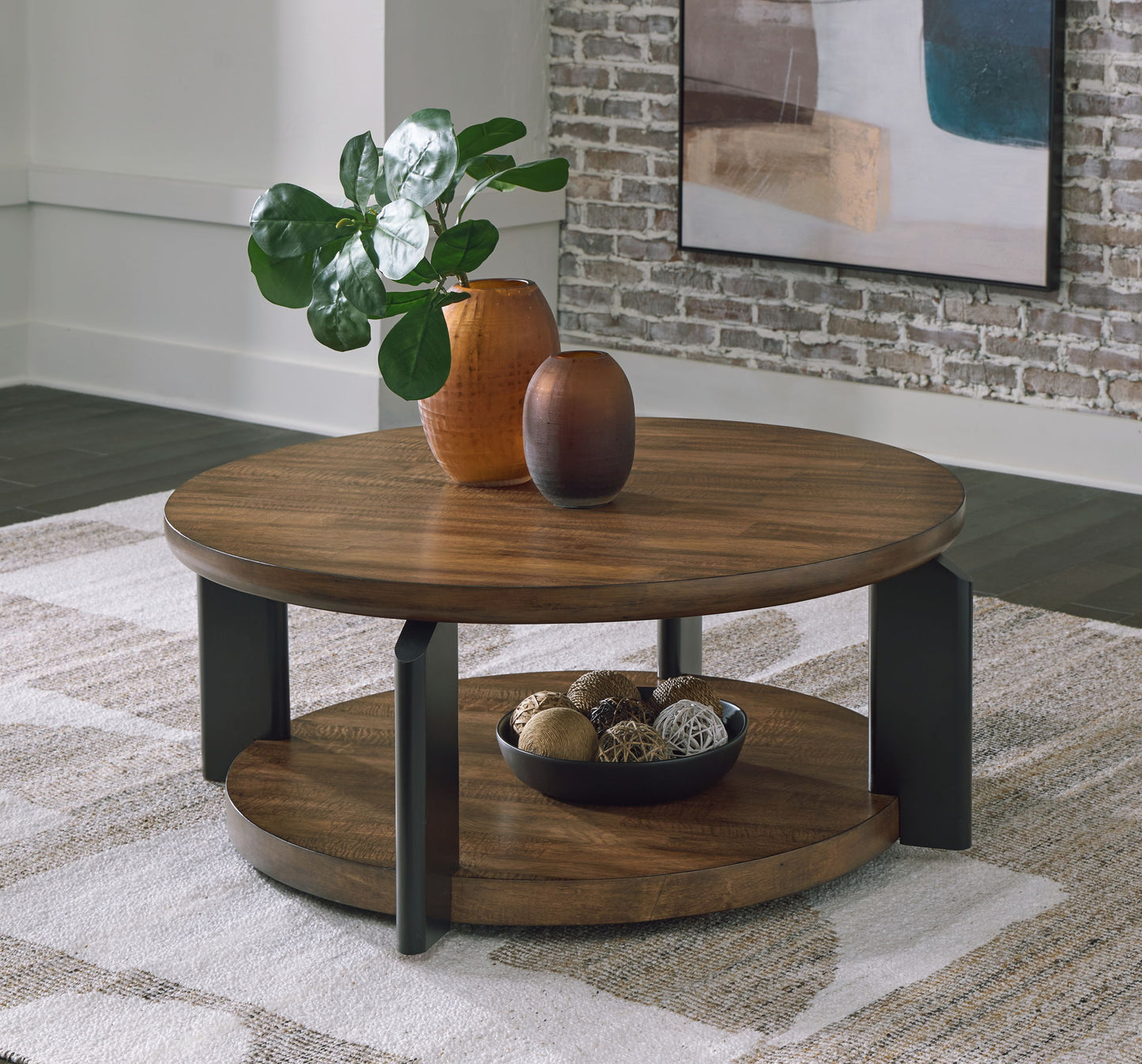 Kraeburn - Brown / Black - Round Cocktail Table - Hornell Furniture Outlet