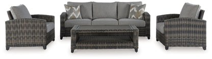 Oasis Court - Gray - Sofa, Chairs, Table Set (Set of 4) - Hornell Furniture Outlet