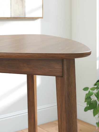Tameride - Triangle Dining Room Table - Brown - Hornell Furniture Outlet
