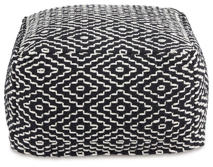 Jasett - Black / Ivory - Pouf - Hornell Furniture Outlet