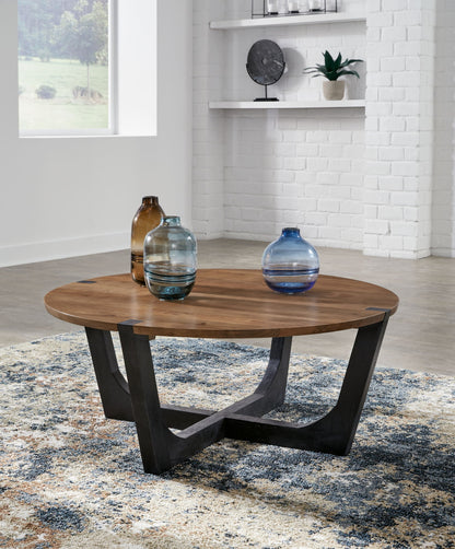 Hanneforth - Round Cocktail Table - Brown - Hornell Furniture Outlet