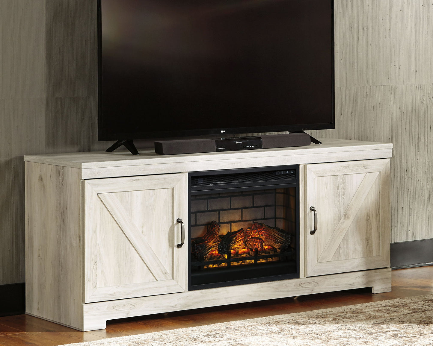 Bellaby - Whitewash - 63" TV Stand With Faux Firebrick Fireplace Insert - Hornell Furniture Outlet