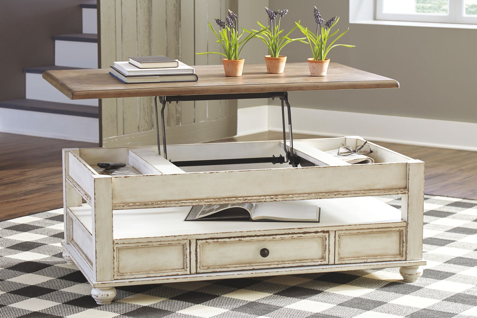Realyn - White / Brown - Lift Top Cocktail Table - Hornell Furniture Outlet