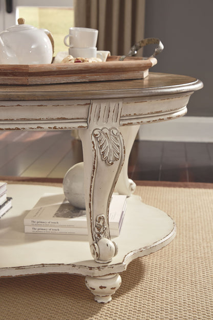 Realyn - White / Brown - Oval Cocktail Table - Hornell Furniture Outlet