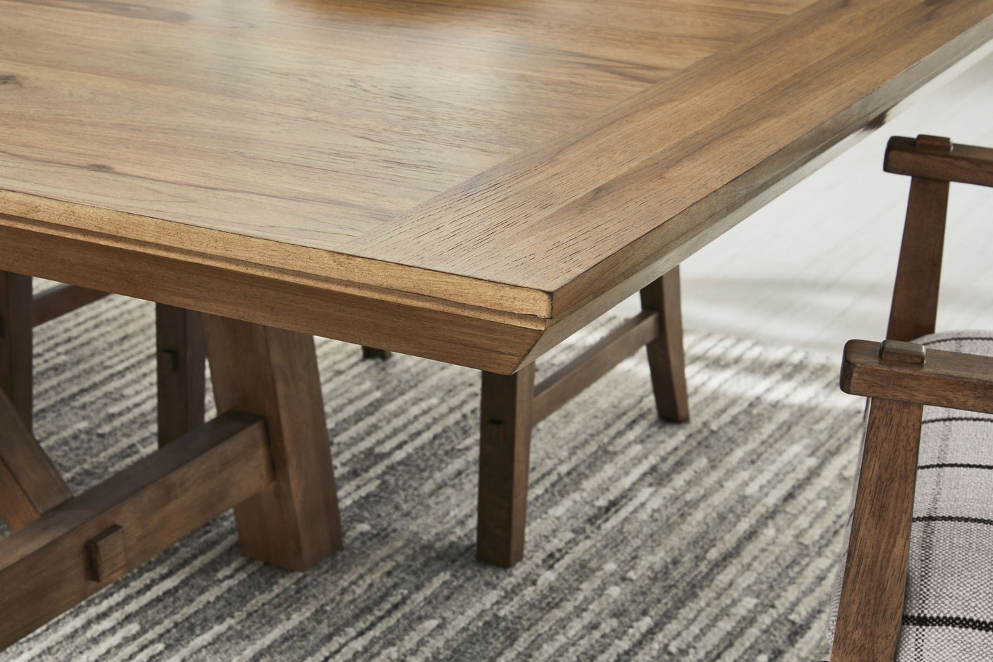 Ridgester - Rectangular Dining Room Extension Table - Light Brown - Hornell Furniture Outlet