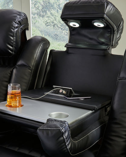 Caveman Den - Midnight - Power Reclining Sofa With Adj Headrest - Hornell Furniture Outlet