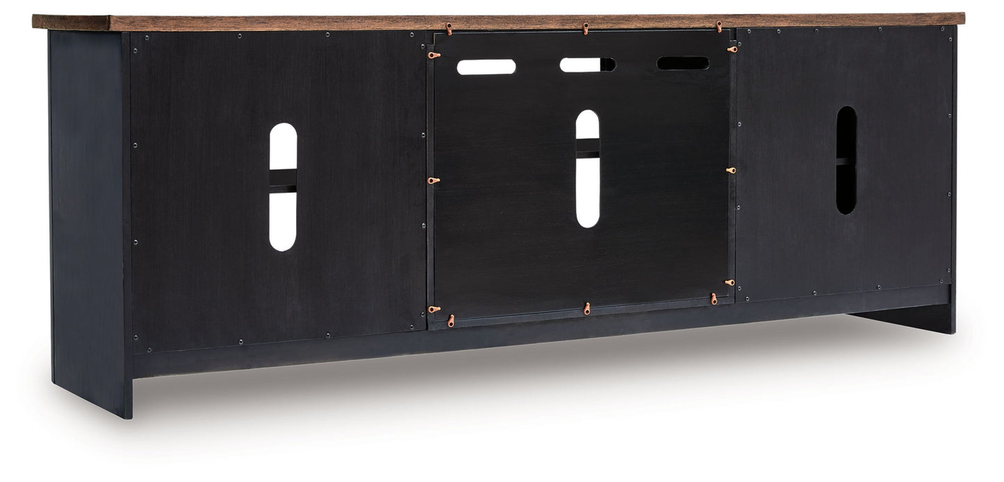 Wildenauer - Brown / Black - XL TV Stand With Fireplace Option - Hornell Furniture Outlet