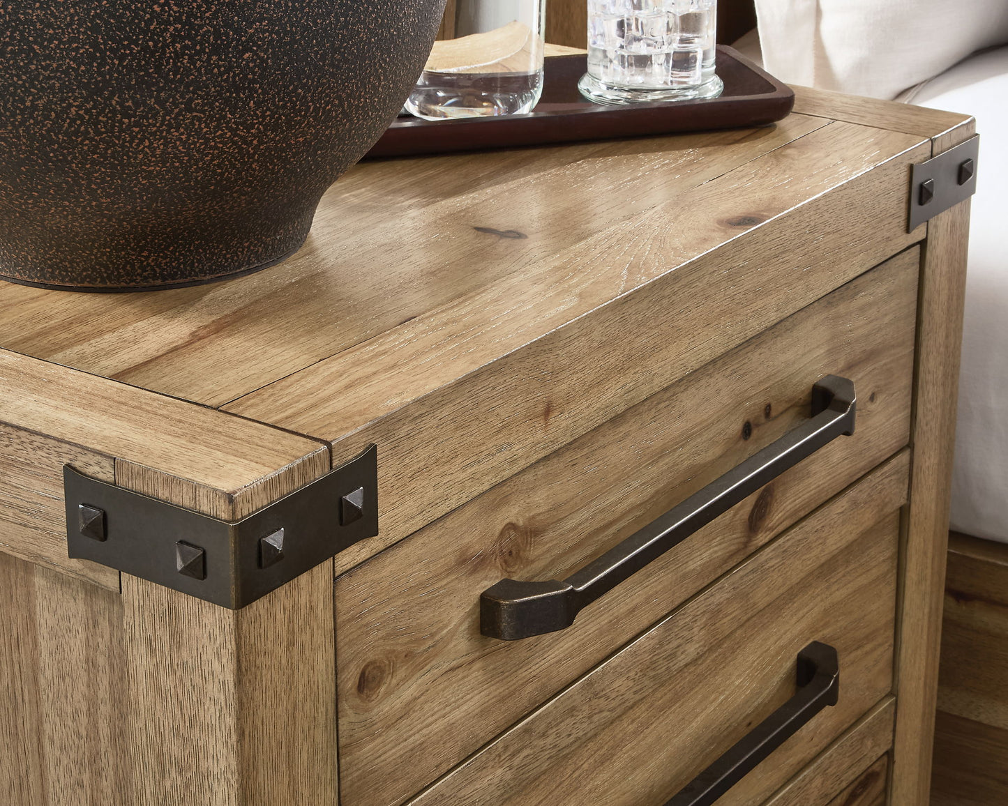 Ridgester - Three Drawer Night Stand - Light Brown - Hornell Furniture Outlet
