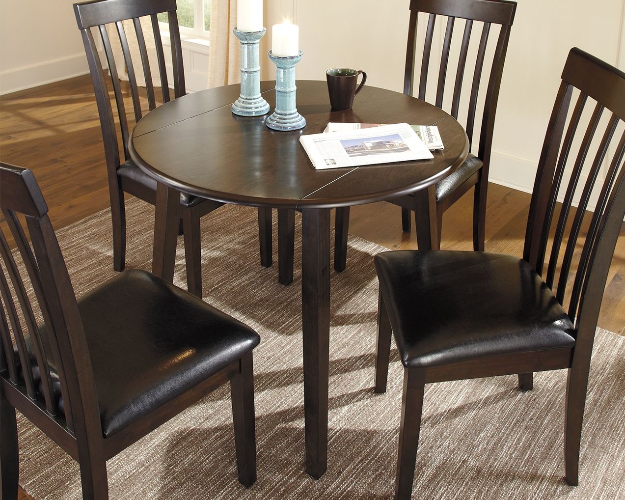 Hammis - Dark Brown - Round DRM Drop Leaf Table - Hornell Furniture Outlet