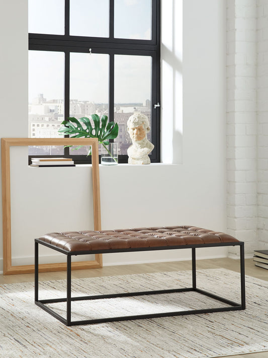 Junsor - Cocktail Ottoman - Brown / Black - Hornell Furniture Outlet