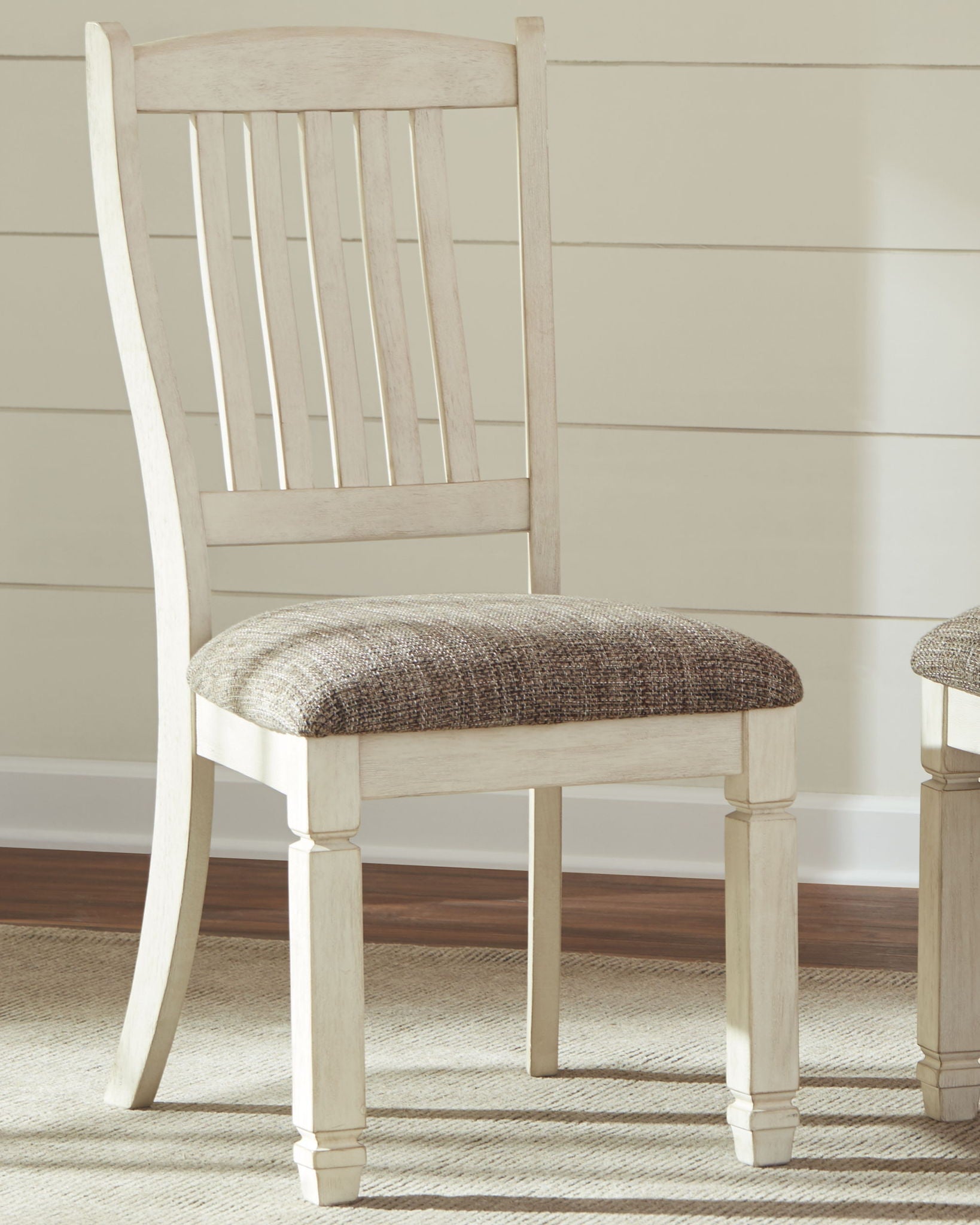 Bolanburg - Brown / Beige - Dining UPH Side Chair (Set of 2) - Rake Back - Hornell Furniture Outlet