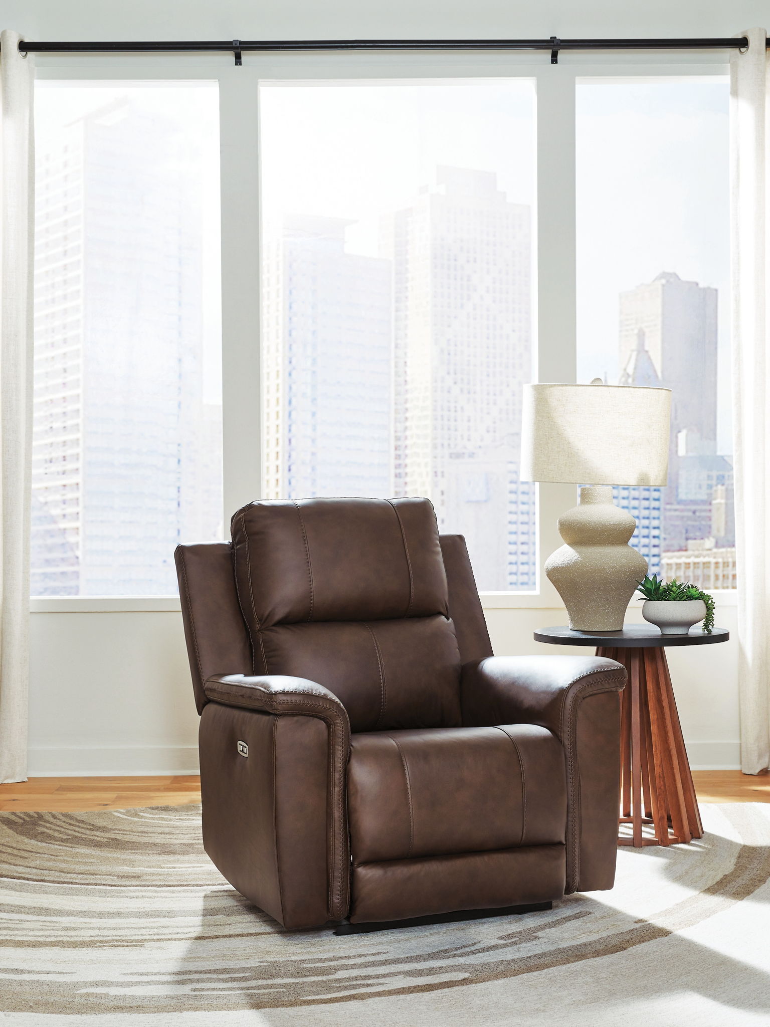 Bleckley - Power Recliner With Adjustable Headrest - Hornell Furniture Outlet