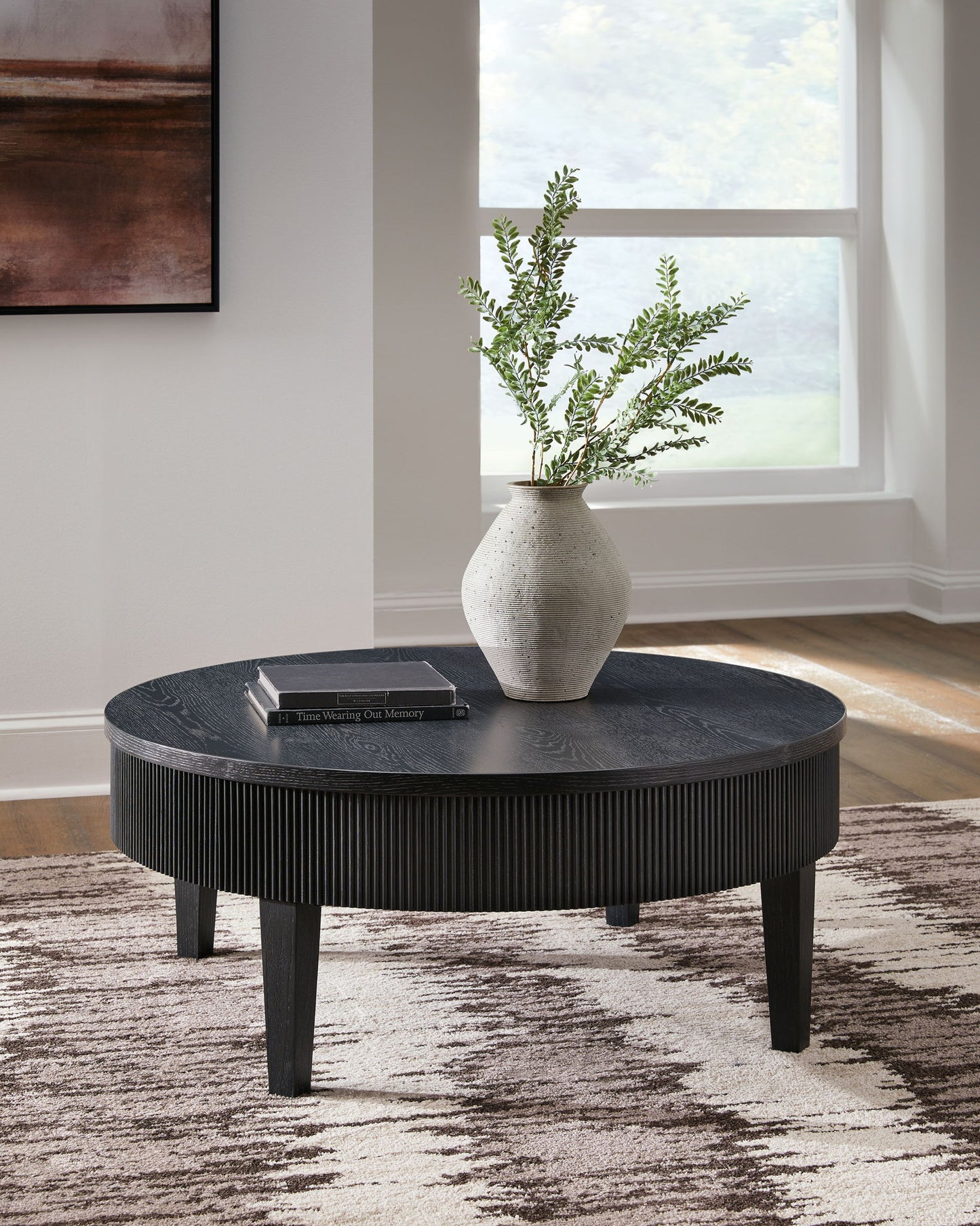 Marstream - Black - Round Cocktail Table - Hornell Furniture Outlet