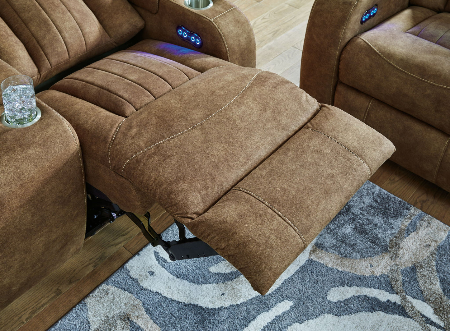 Wolfridge - Brindle - Power Reclining Loveseat With Console /Adj Hdrst - Hornell Furniture Outlet