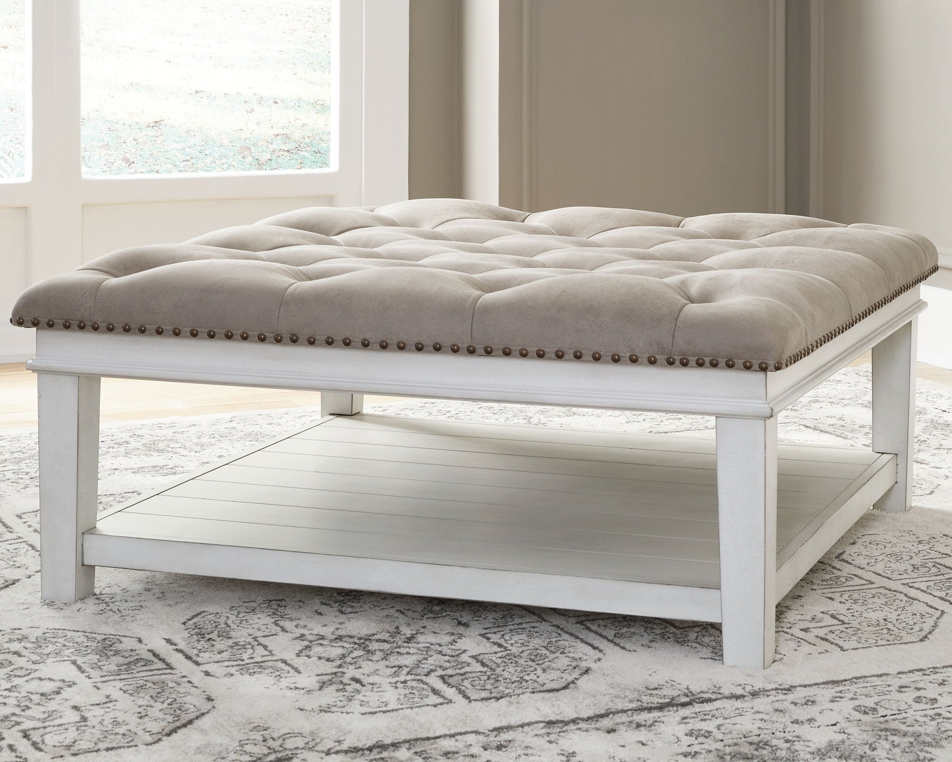 Kanwyn - Whitewash - Uph Ottoman Cocktail Table - Hornell Furniture Outlet
