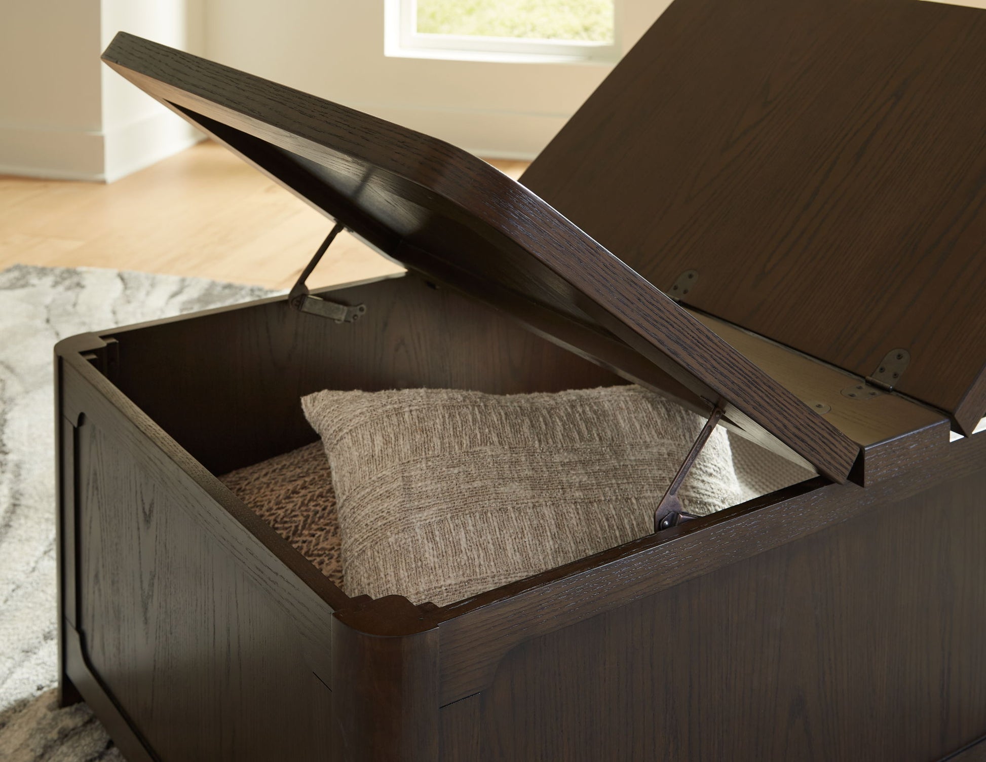 Breckington - Dark Brown - Cocktail Table With Storage - Hornell Furniture Outlet