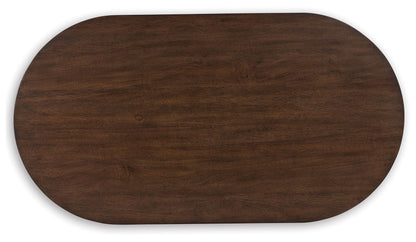 Korestone - Dark Brown - Oval Cocktail Table - Hornell Furniture Outlet