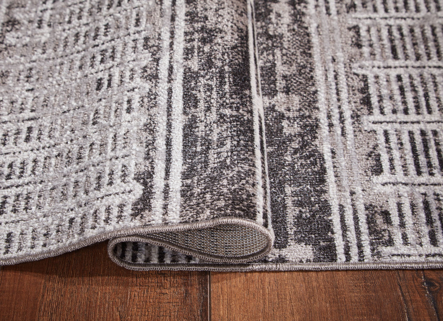Henchester - Rug - Hornell Furniture Outlet