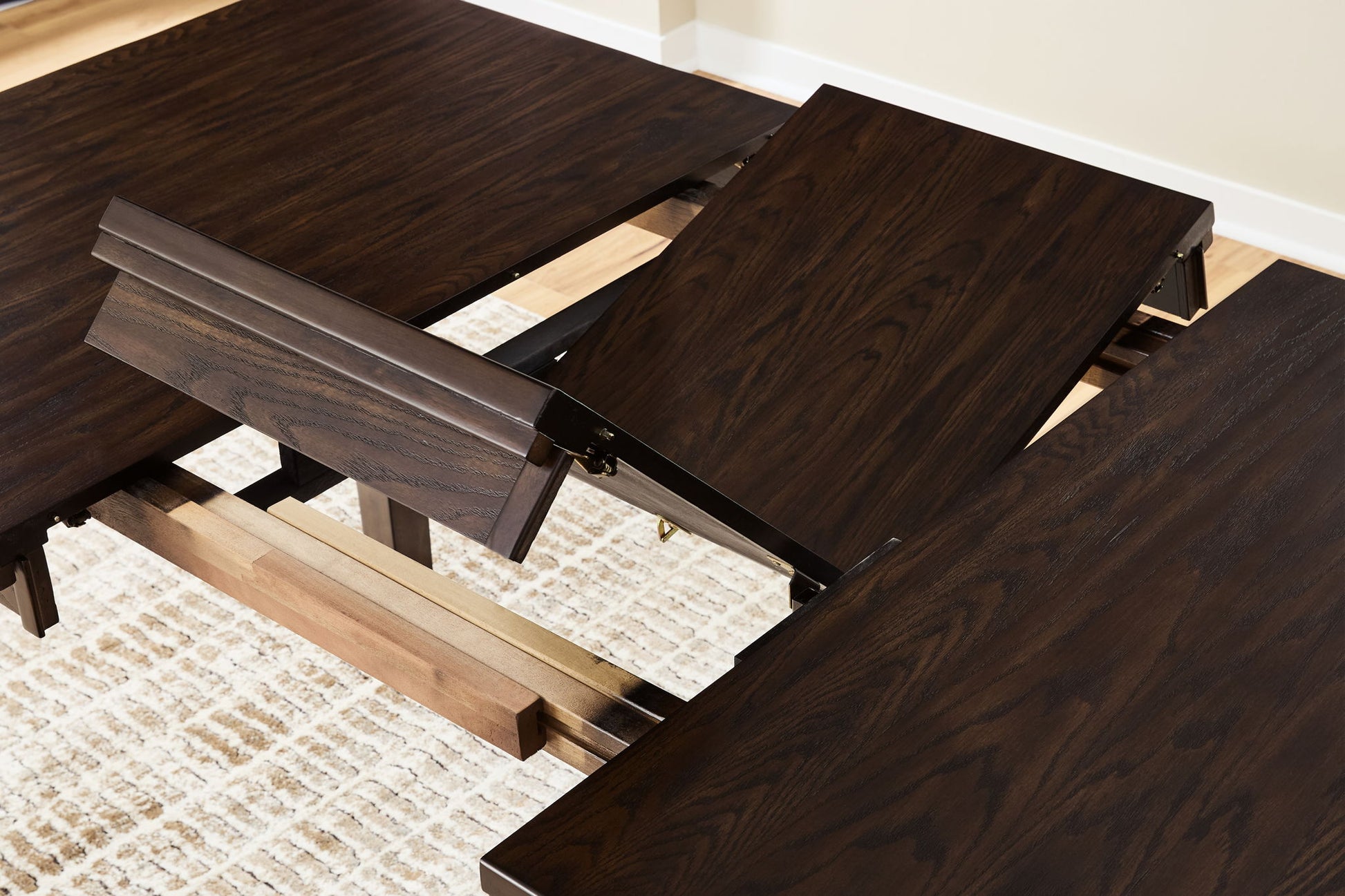 Haddigan - Dining Room Extension Table - Hornell Furniture Outlet