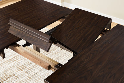Haddigan - Dining Room Extension Table - Hornell Furniture Outlet