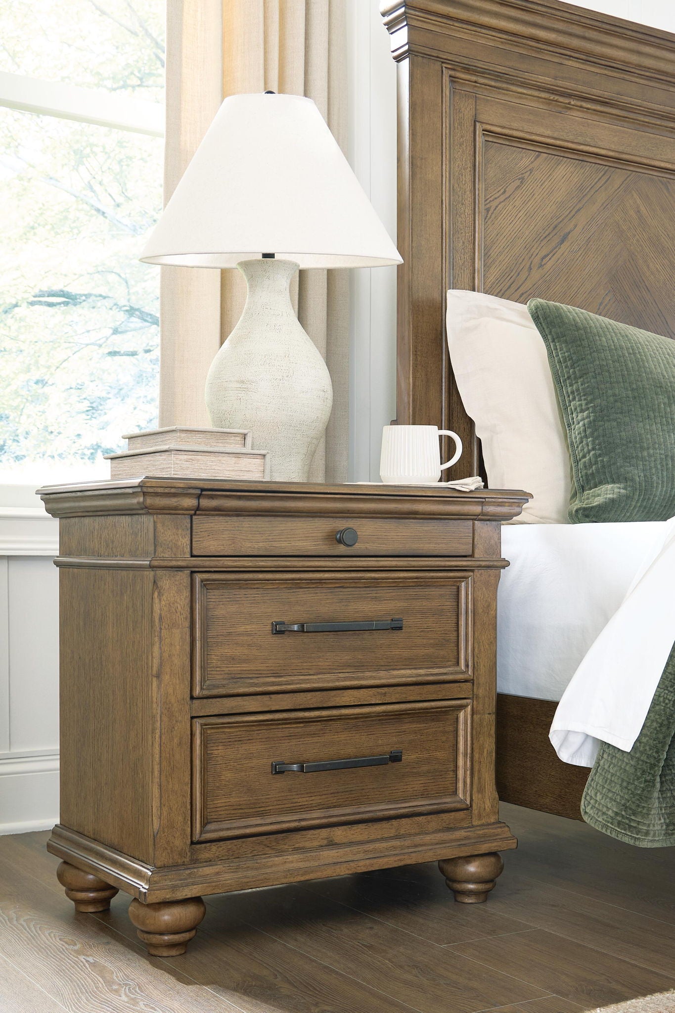 Karallin - Three Drawer Night Stand - Medium Brown - Hornell Furniture Outlet