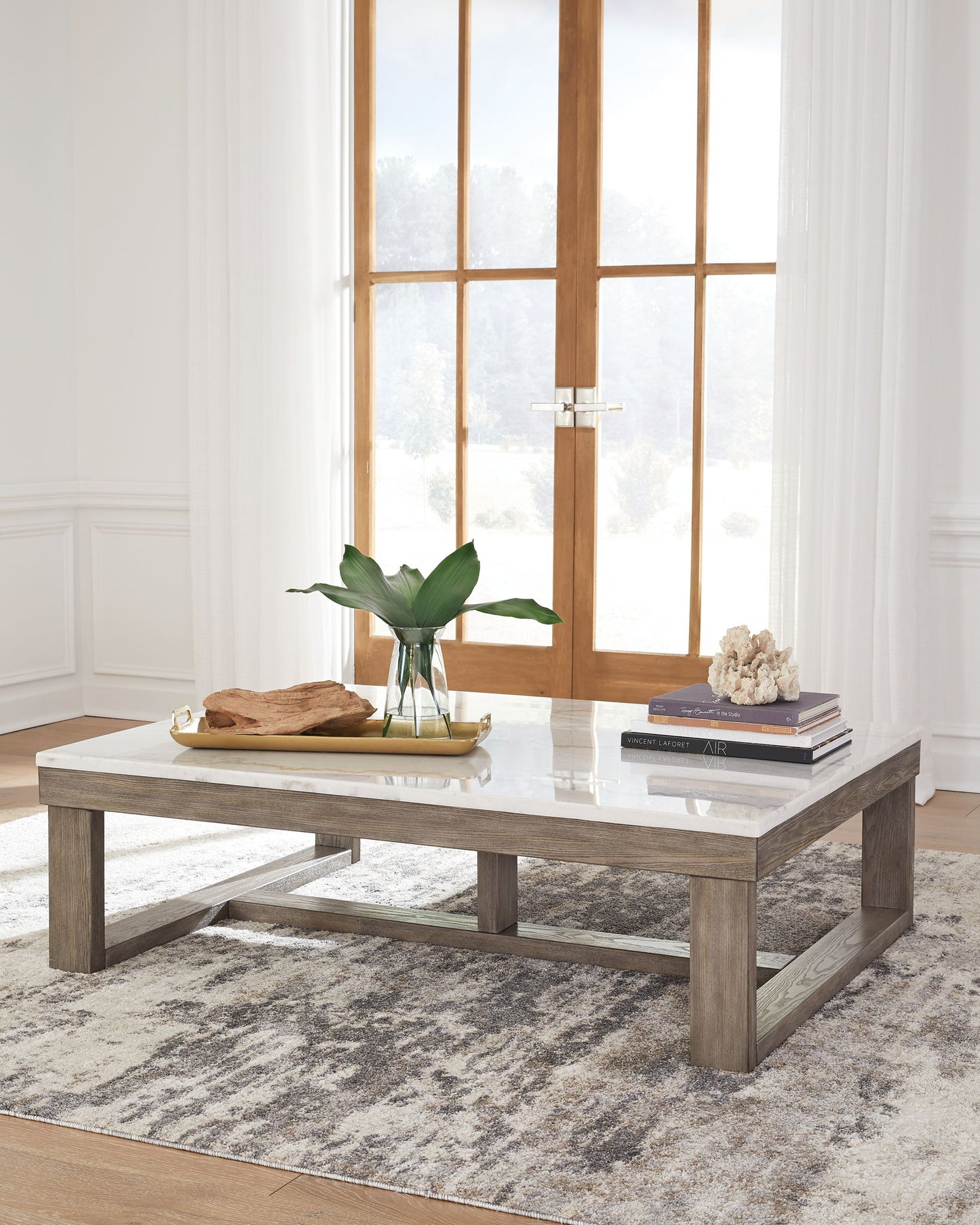 Loyaska - Brown / Ivory - Rectangular Cocktail Table - Hornell Furniture Outlet