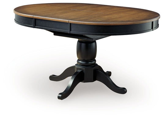 Clorazi - Oval Dining Room Butterfly Extension Table - Black / Brown - Hornell Furniture Outlet