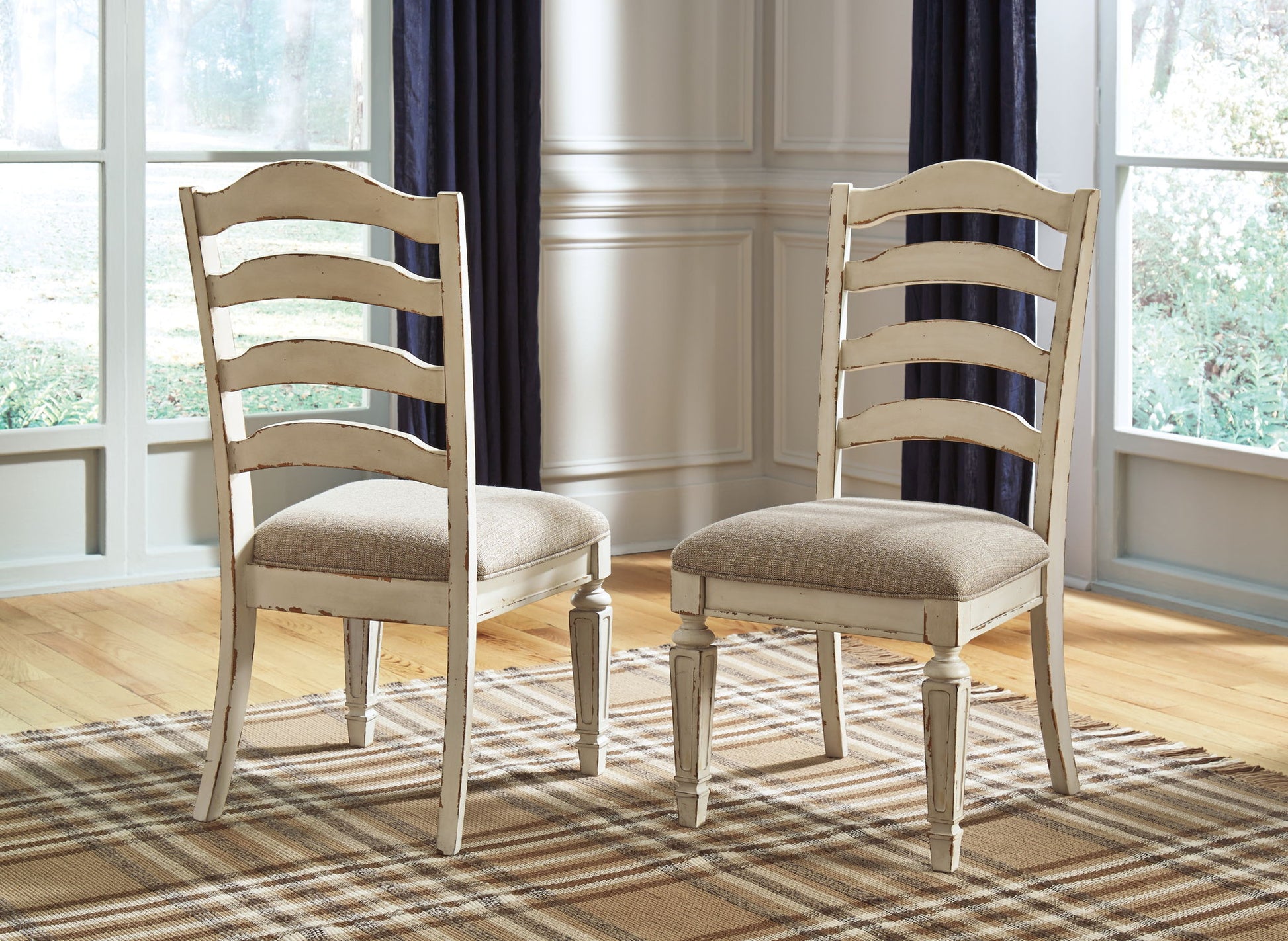 Realyn - Dining UPH Side Chair (Set of 2) - Ladderback - Chipped White - Hornell Furniture Outlet