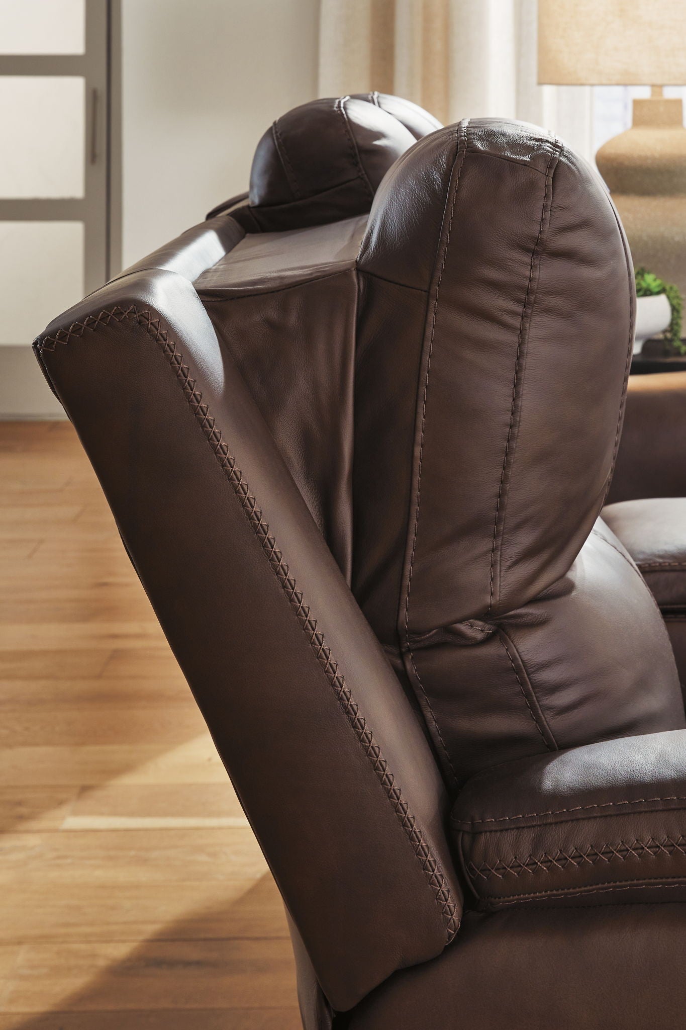 Bleckley - Power Reclining Loveseat With Console / Adjustable Headrest - Hornell Furniture Outlet