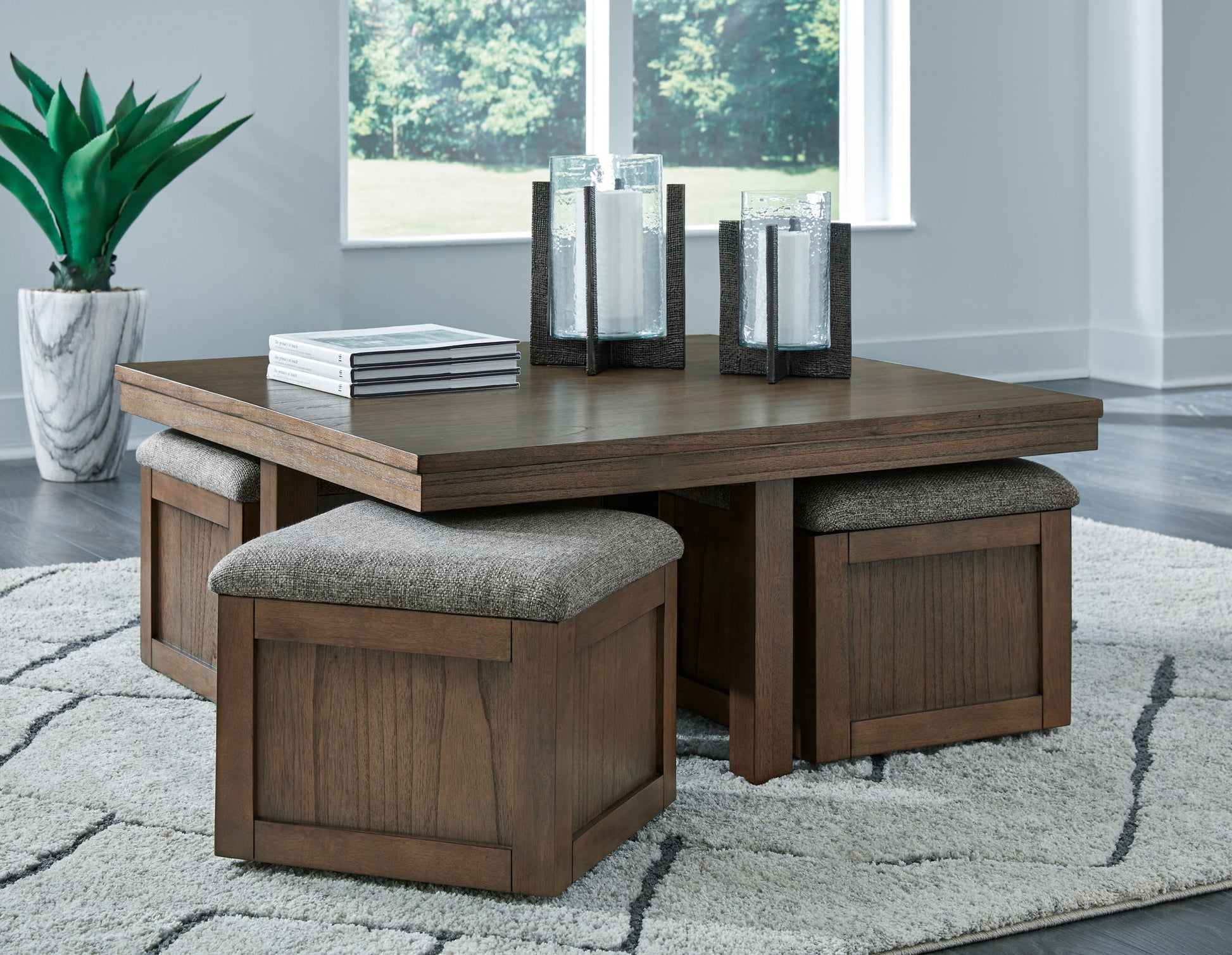 Boardernest - Brown - Cocktail Table With 4 Stools (Set of 5) - Hornell Furniture Outlet
