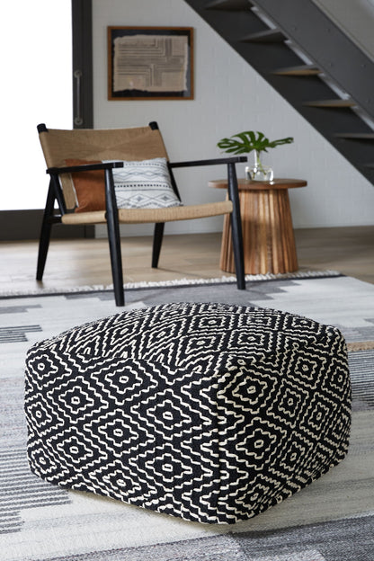 Jasett - Black / Ivory - Pouf - Hornell Furniture Outlet