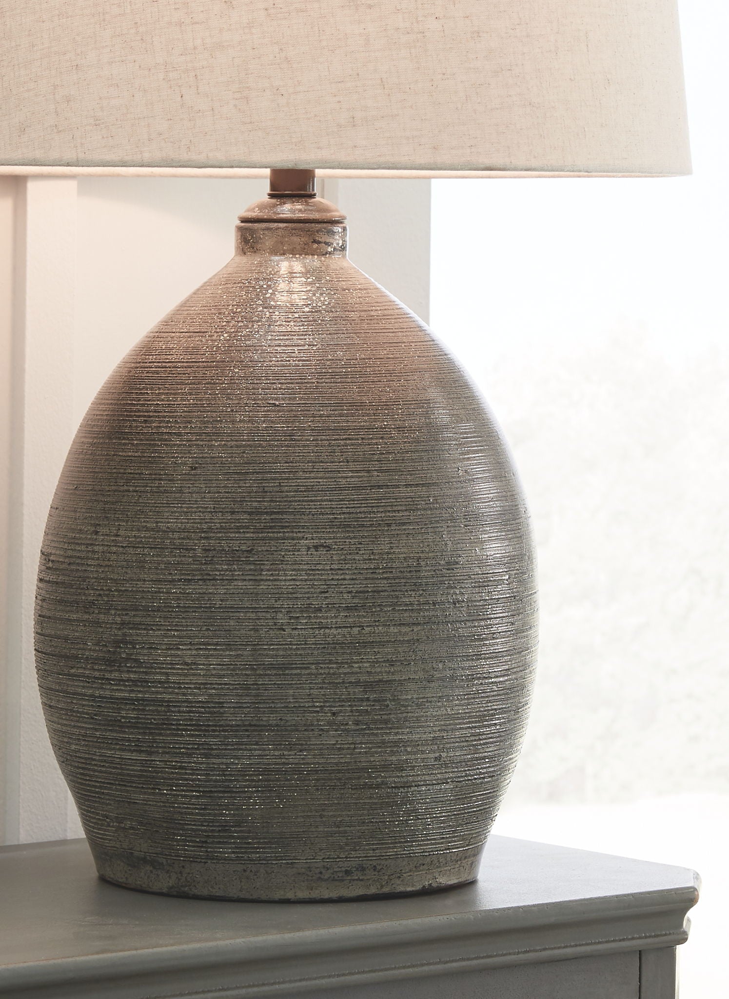 Joyelle - Gray - Terracotta Table Lamp - Hornell Furniture Outlet