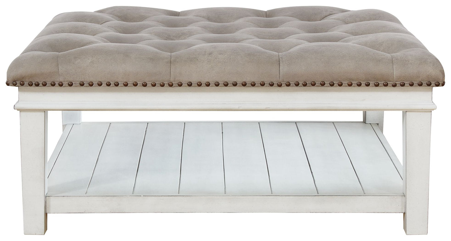 Kanwyn - Whitewash - Uph Ottoman Cocktail Table - Hornell Furniture Outlet